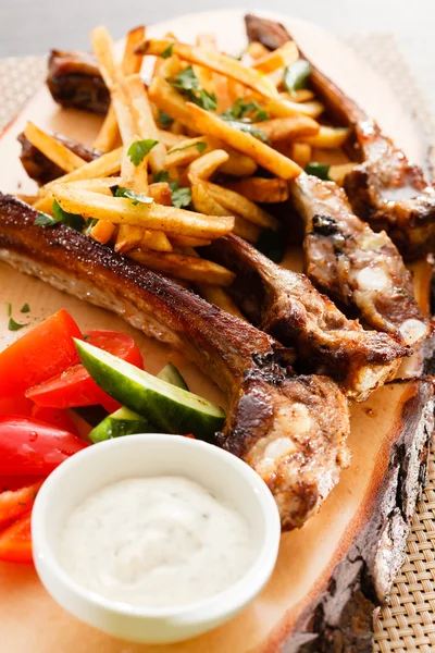 Ribs with french fries — Stock Photo, Image