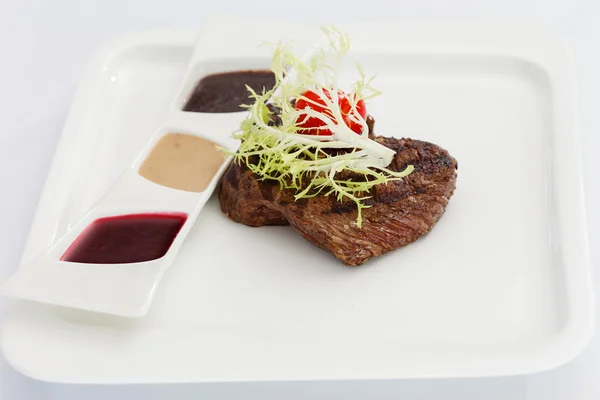 Steak with sauces — Stock Photo, Image