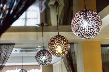Ball lamps in restaurant clipart