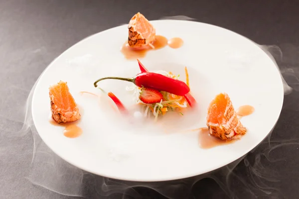 Salmon and chili pepper — Stock Photo, Image