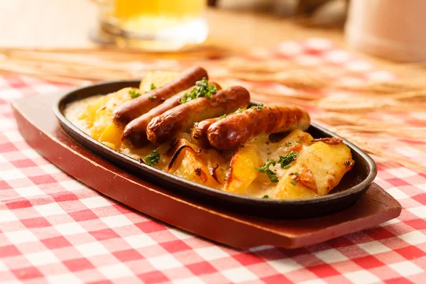 Roasted potatoes with sausage — Stock Photo, Image