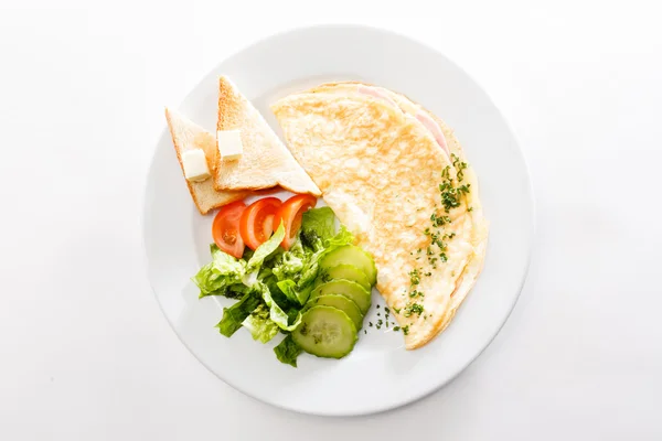 Omelette breakfast on plate — Stock Photo, Image