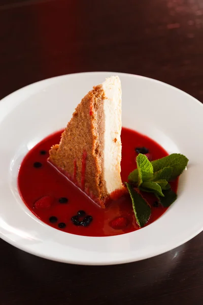 Cheesecake with berry sauce — Stock Photo, Image