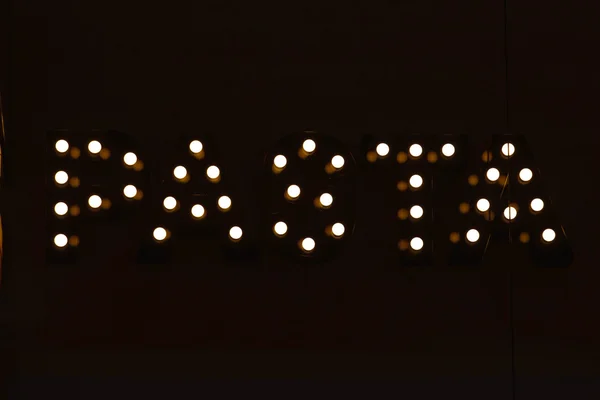 Palabra de pasta hecha de luces — Foto de Stock