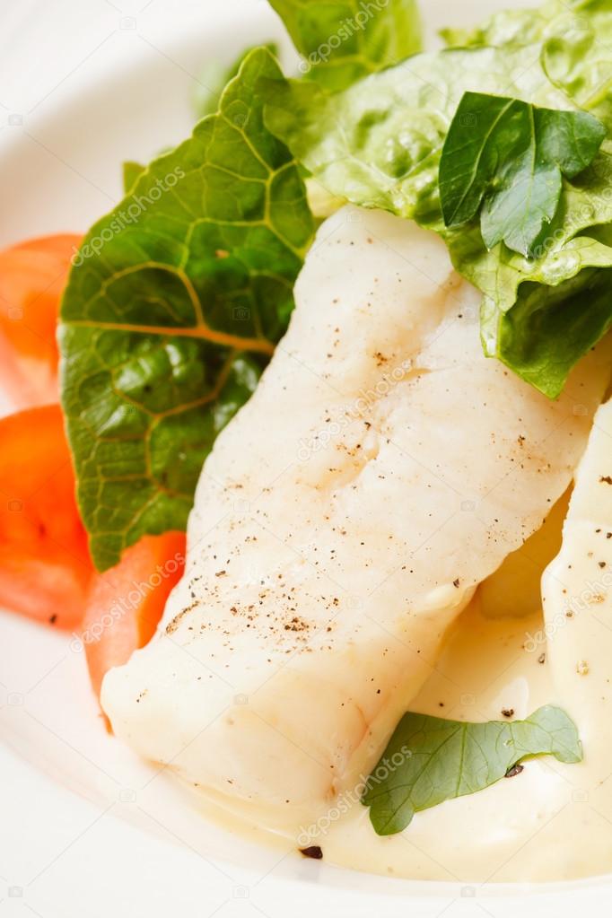 Fish with vegetables closeup