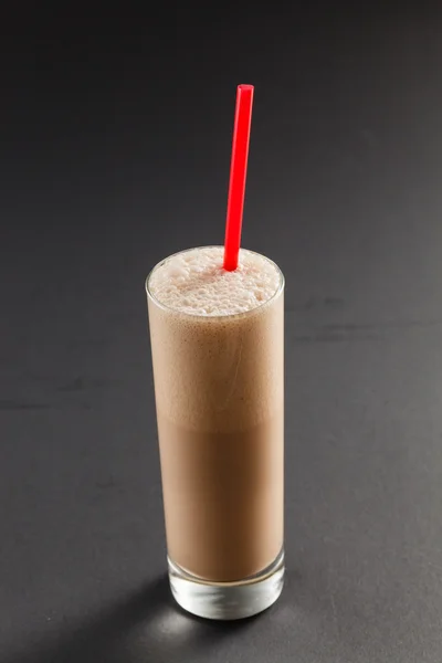 Chocolate smoothie with straw — Stock Photo, Image