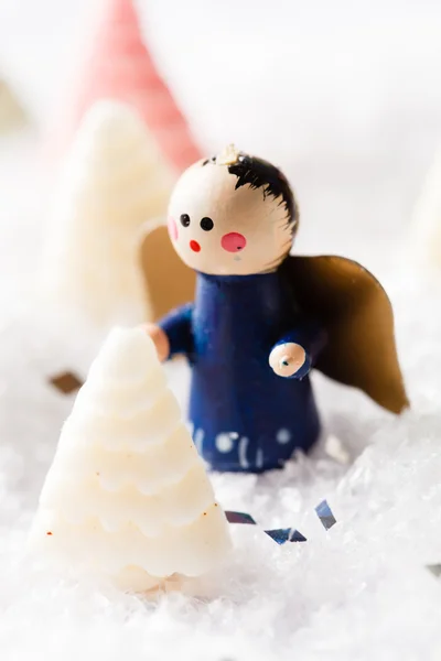 Christmas doll on the ice — Stock Photo, Image