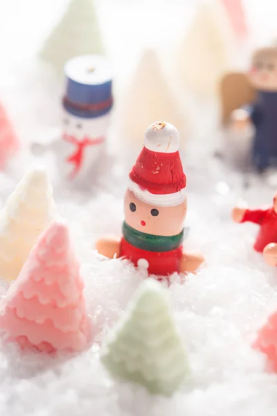 Christmas dolls on the ice — Stock Photo, Image