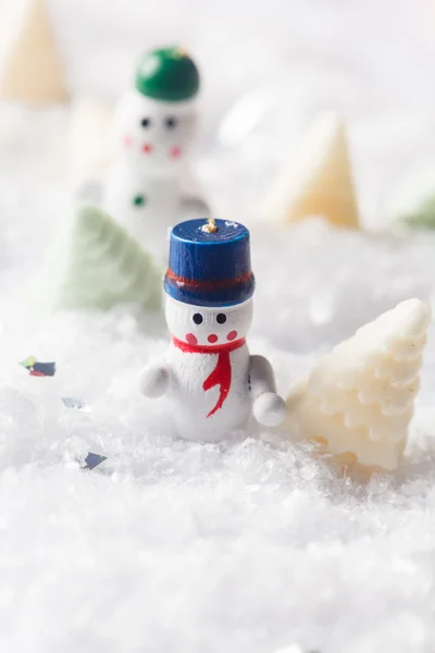 Christmas dolls on the ice — Stock Photo, Image