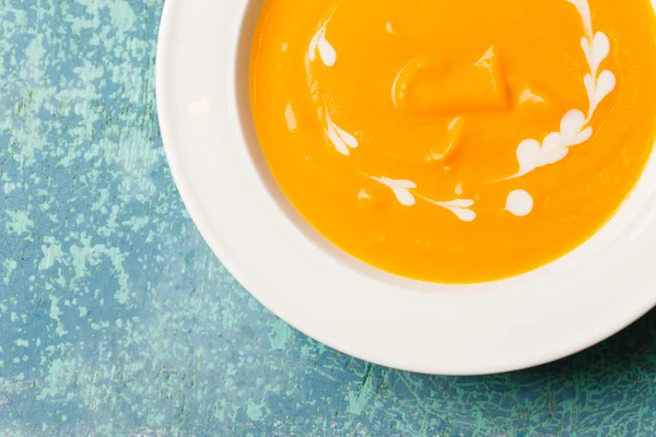 Pumpkin soup on table — Stock Photo, Image