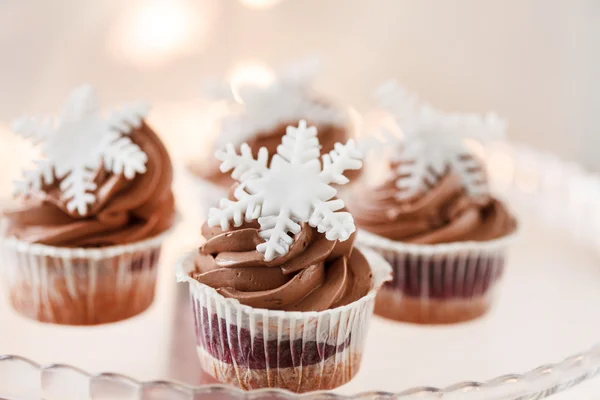 Cupcakes com flocos de neve doces — Fotografia de Stock