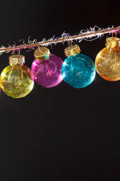 Christmas balls hanging on ribbon — Stock Photo, Image