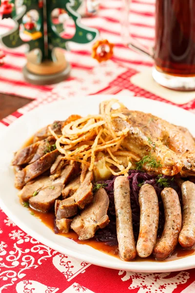 Roasted meat on Christmas table — Stock Photo, Image