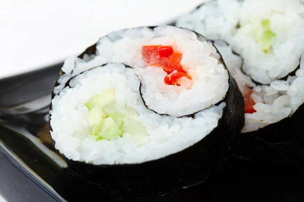 Tasty sushi on plate — Stock Photo, Image