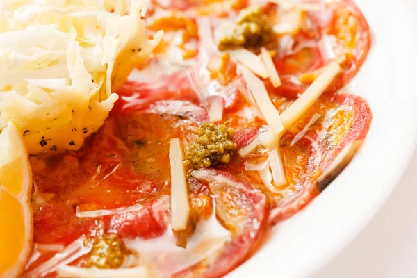 Meat carpaccio on plate — Stock Photo, Image