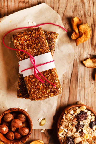 Granola bars on wooden table — Stock Photo, Image