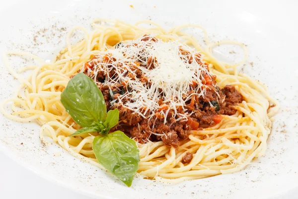 Spaghetti bolognese with basil — Stock Photo, Image