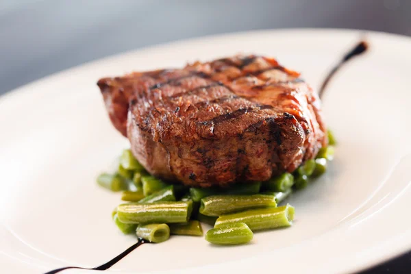 Steak with beans — Stock Photo, Image