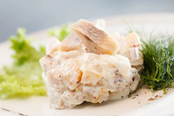 Herring salad on plate — Stock Photo, Image