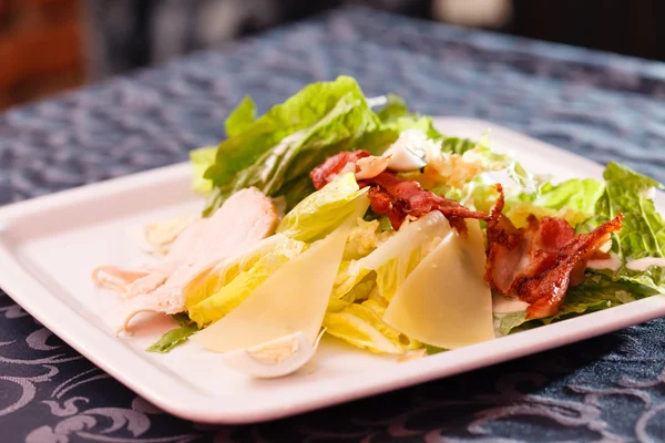 Caesar salad on plate — Stock Photo, Image