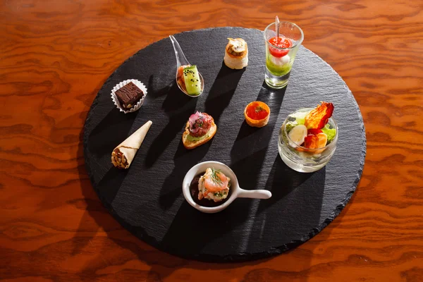 Set of canapes on table — Stock Photo, Image