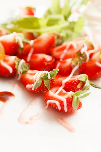 Strawberries with sweet sauce — Stock Photo, Image