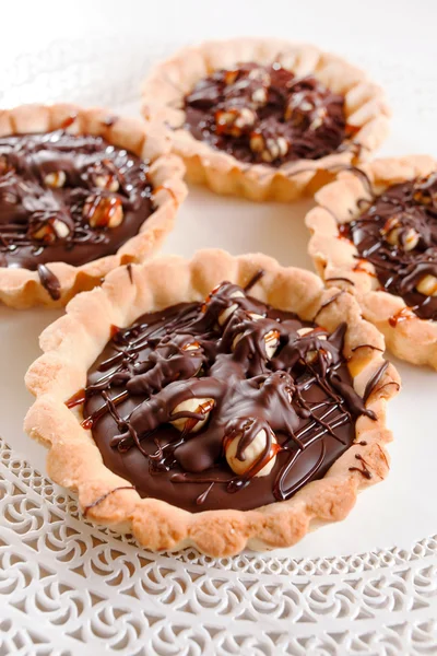 Chocolate tarts with nuts — Stock Photo, Image