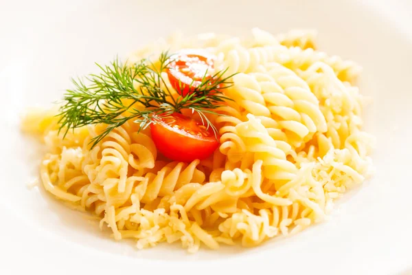 Pasta with cheese and tomatoes — Stock Photo, Image