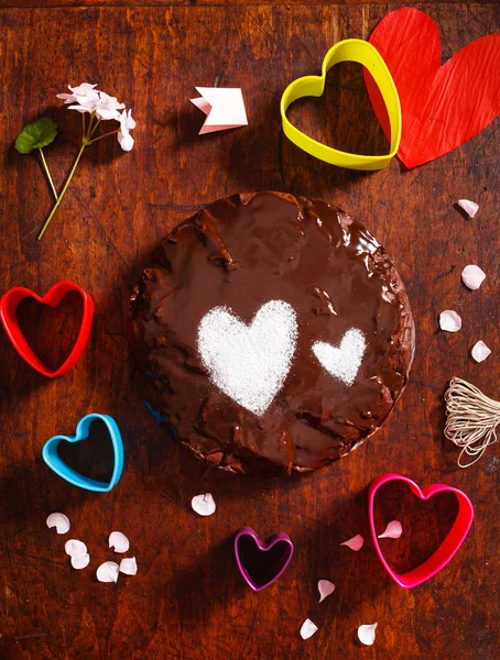 Chocolate cake with hearts — Stock Photo, Image