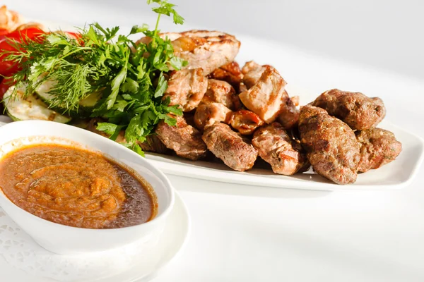 Meat appetizer with sauce — Stock Photo, Image