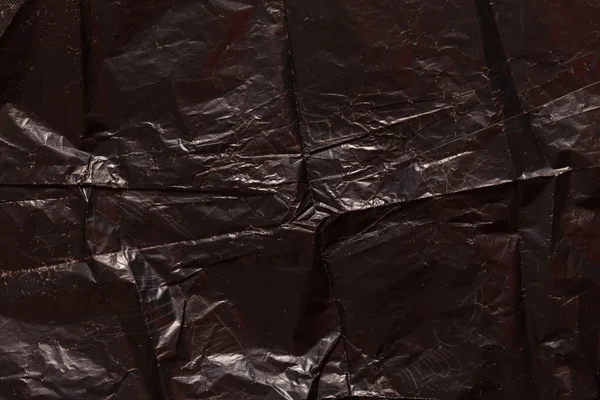 Black wrinkled  paper — Stock Photo, Image