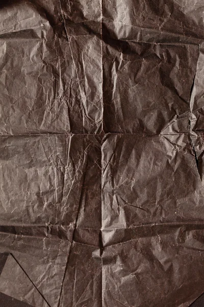 Black wrinkled  paper — Stock Photo, Image