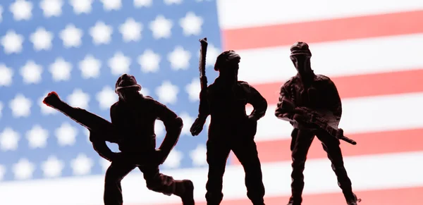 American soldiers on flag background — Stock Photo, Image