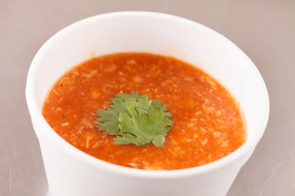 Tomato soup grey background — Stock Photo, Image