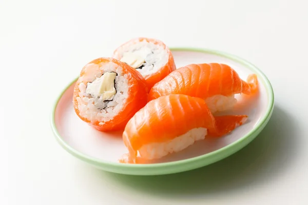 Tasty sushi on plate — Stock Photo, Image