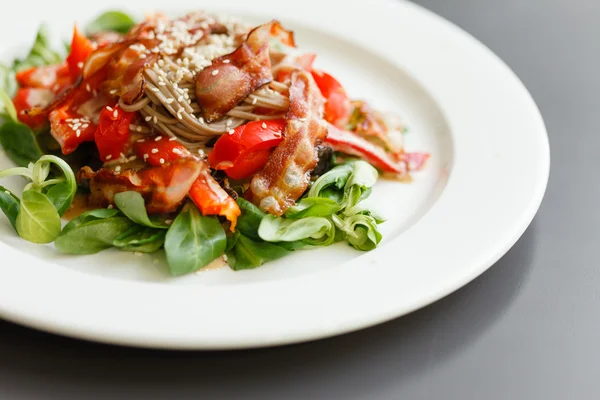 Salad with noodle and bacon — Stock Photo, Image