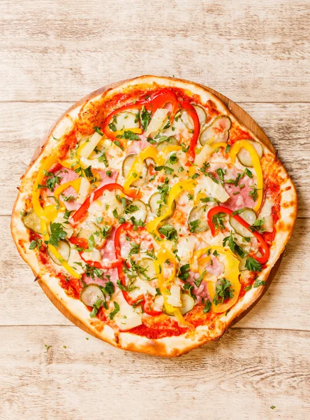 Pizza on the wood background — Stock Photo, Image