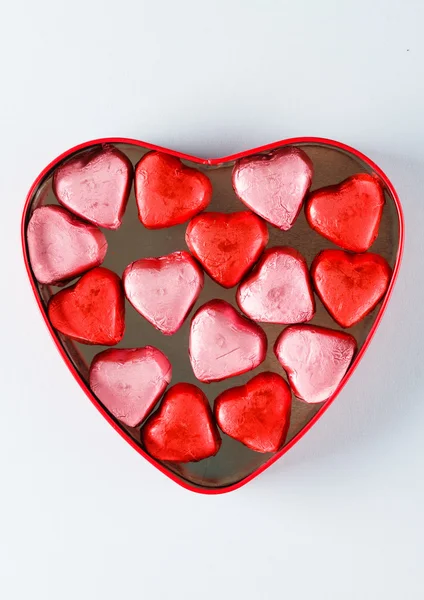 Scatola cuore con caramelle cuore — Foto Stock