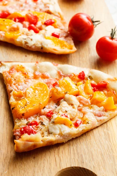 Sliced pizza on table — Stock Photo, Image