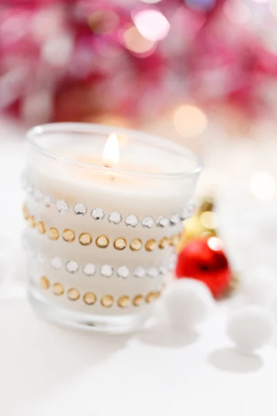 Christmas candle on blurred — Stock Photo, Image