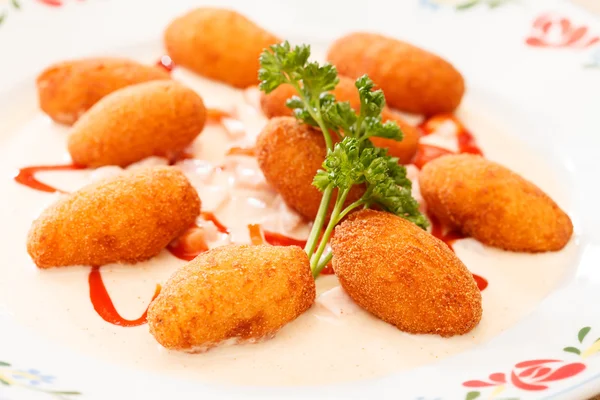 Potato balls with sauce — Stock Photo, Image