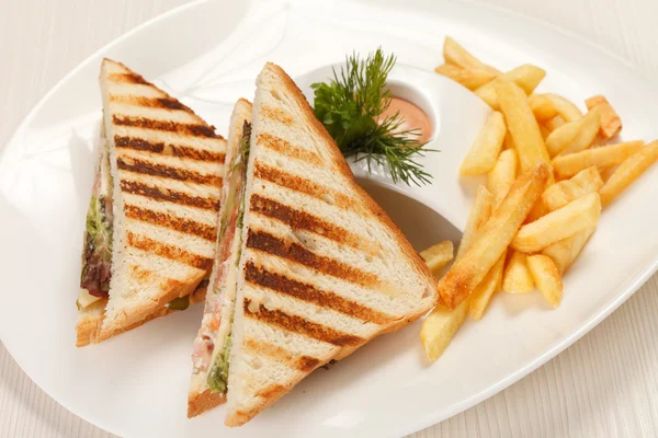 Sandwiches with French fried potatoes — Stock Photo, Image