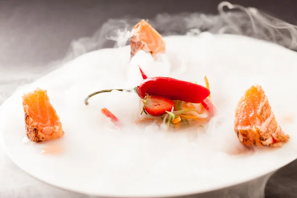 Salmon and chili pepper — Stock Photo, Image