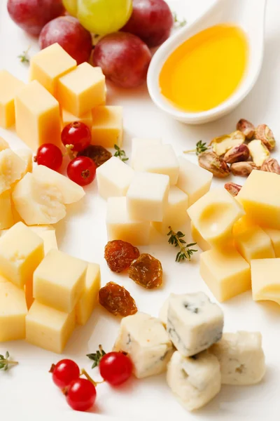 Cheese plate with snacks — Stock Photo, Image