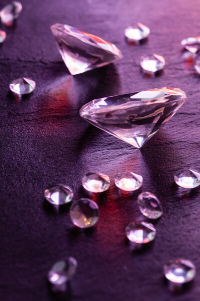 Different diamonds with purple light