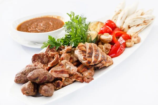 Meat appetizer with sauce — Stock Photo, Image