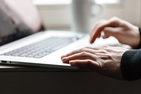 Man hands with laptop
