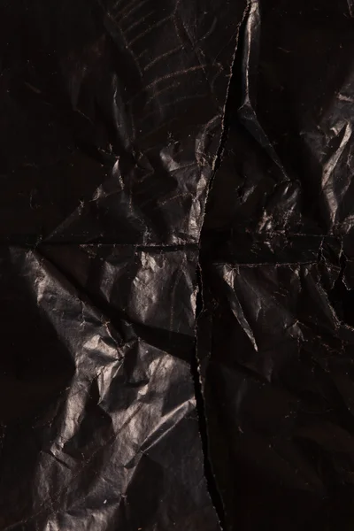 Black crumpled paper — Stock Photo, Image