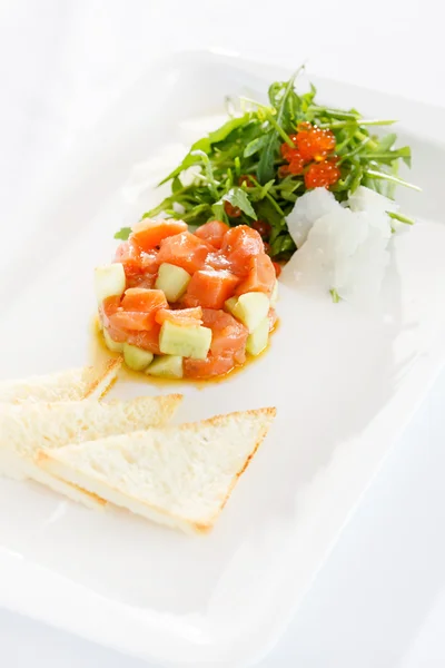 Salmon tartar with bread — Stock Photo, Image