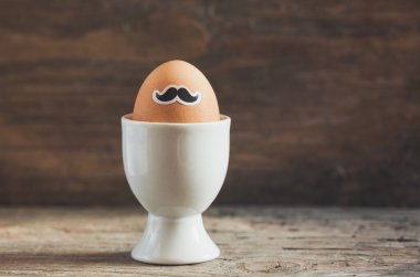 Easter egg with mustaches clipart
